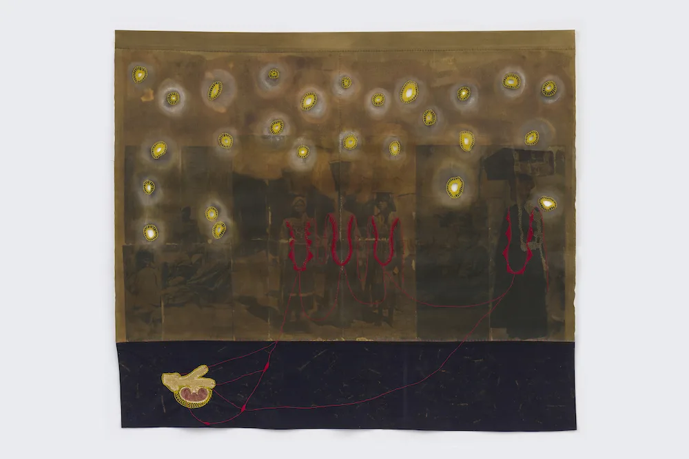 Mixed-media artwork with ghostly figures, red embroidered outlines, and glowing yellow ovals on rust-toned canvas.