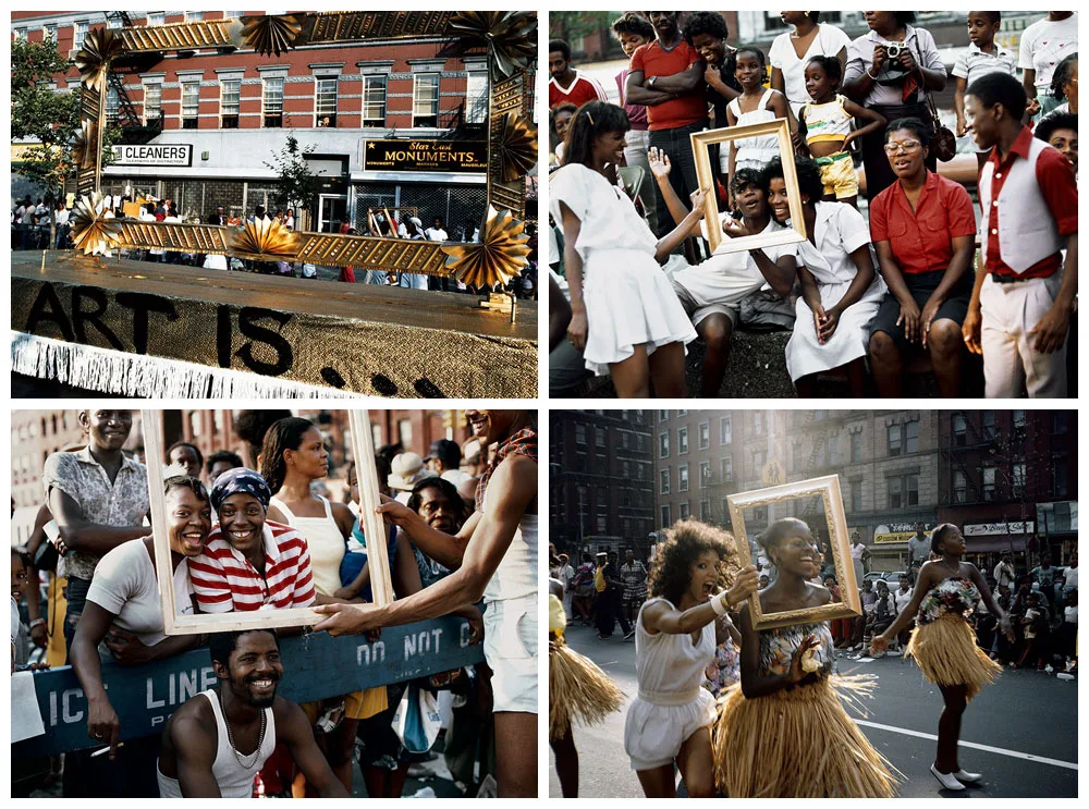 Paradegoers smile and pose in golden picture frames during a Harlem street parade celebrating Black identity and art.
