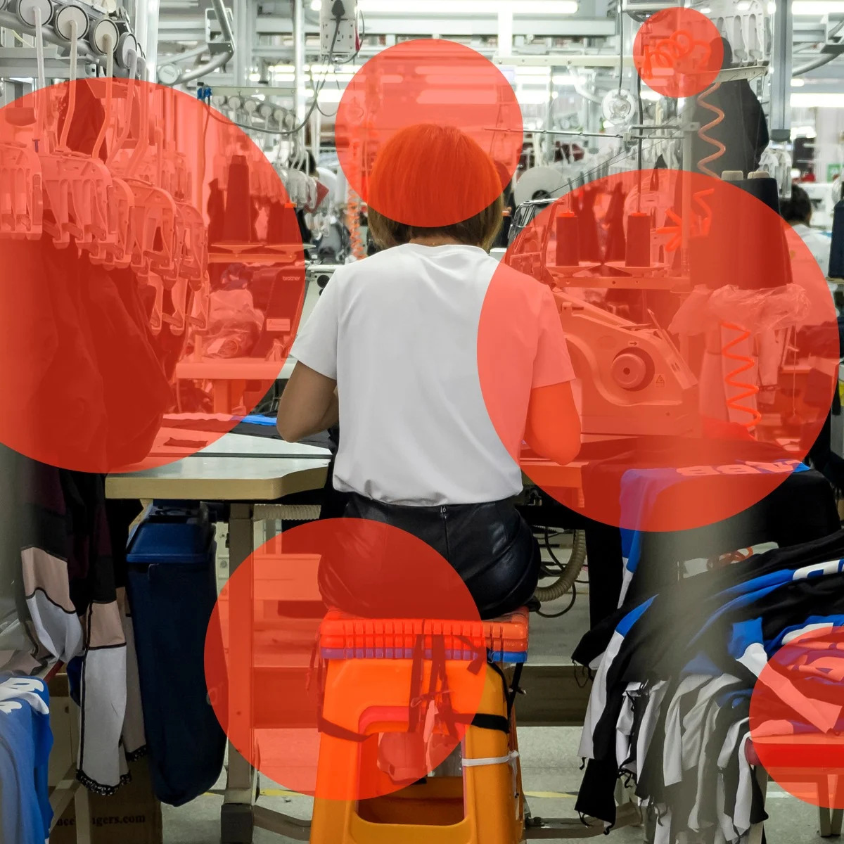 Garment factory overlain with orange dots.