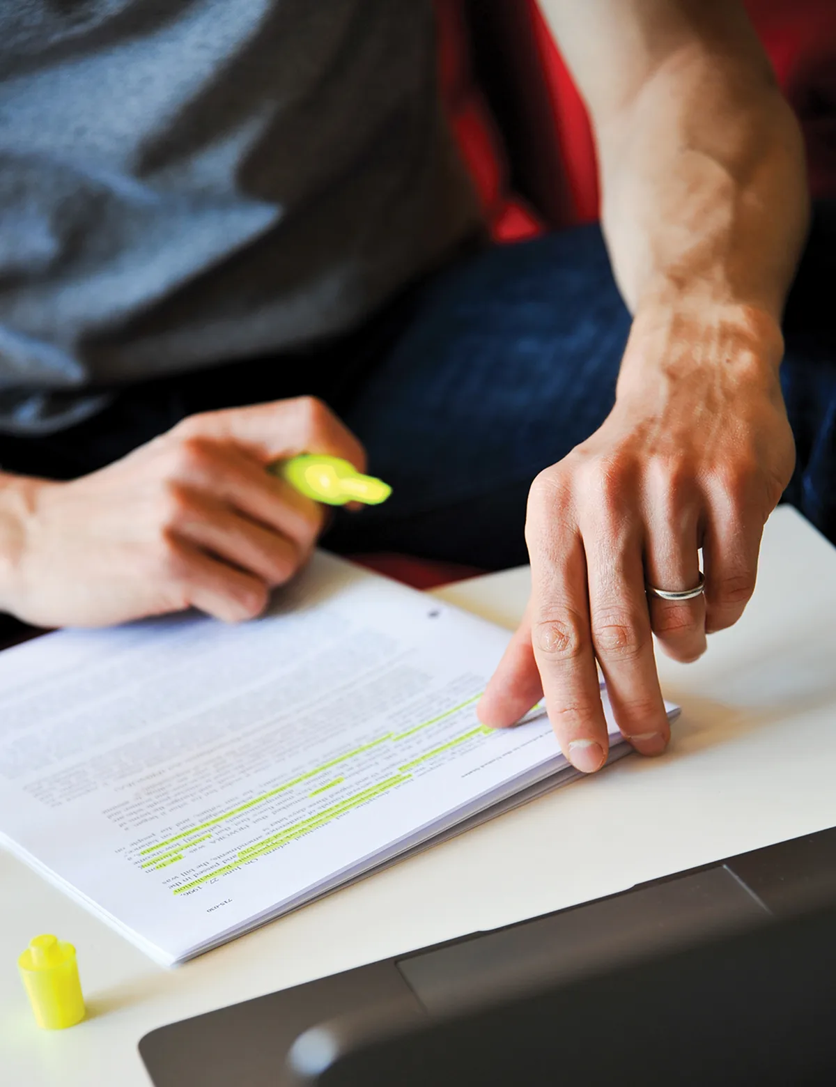 An MBA student considers a case study before a class discussion.