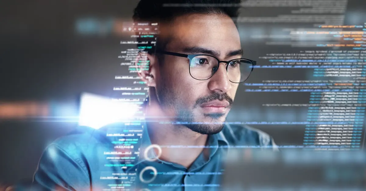 Professional analyzing data on a computer screen with lines of code and data visualizations overlaid in the foreground.