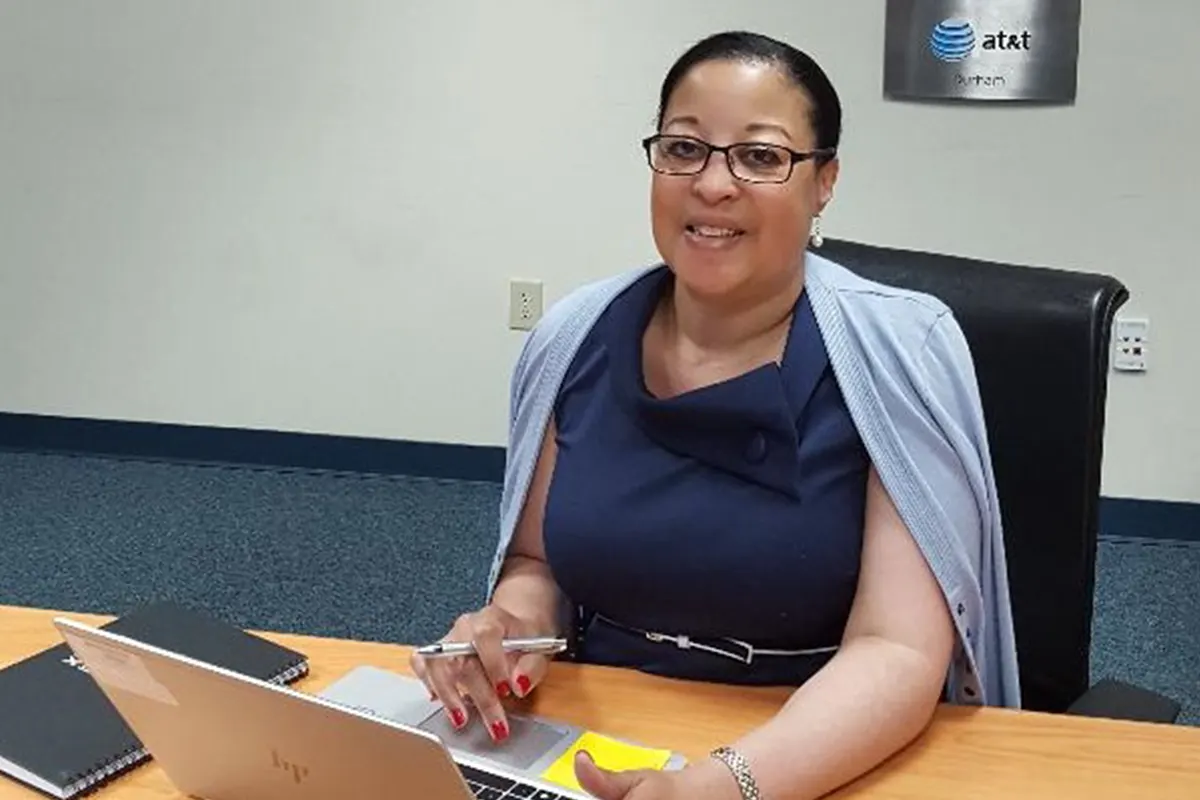 Pamela Raymond at her desk