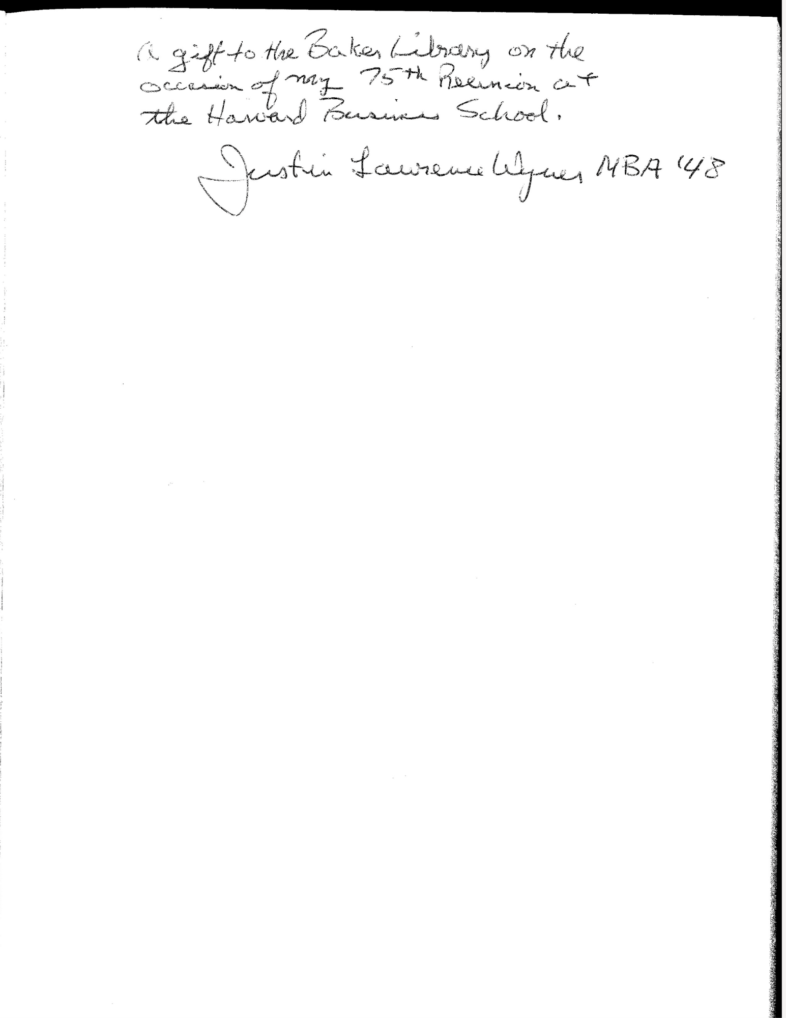 A book dedication to Baker Library written in a flowing cursive hand