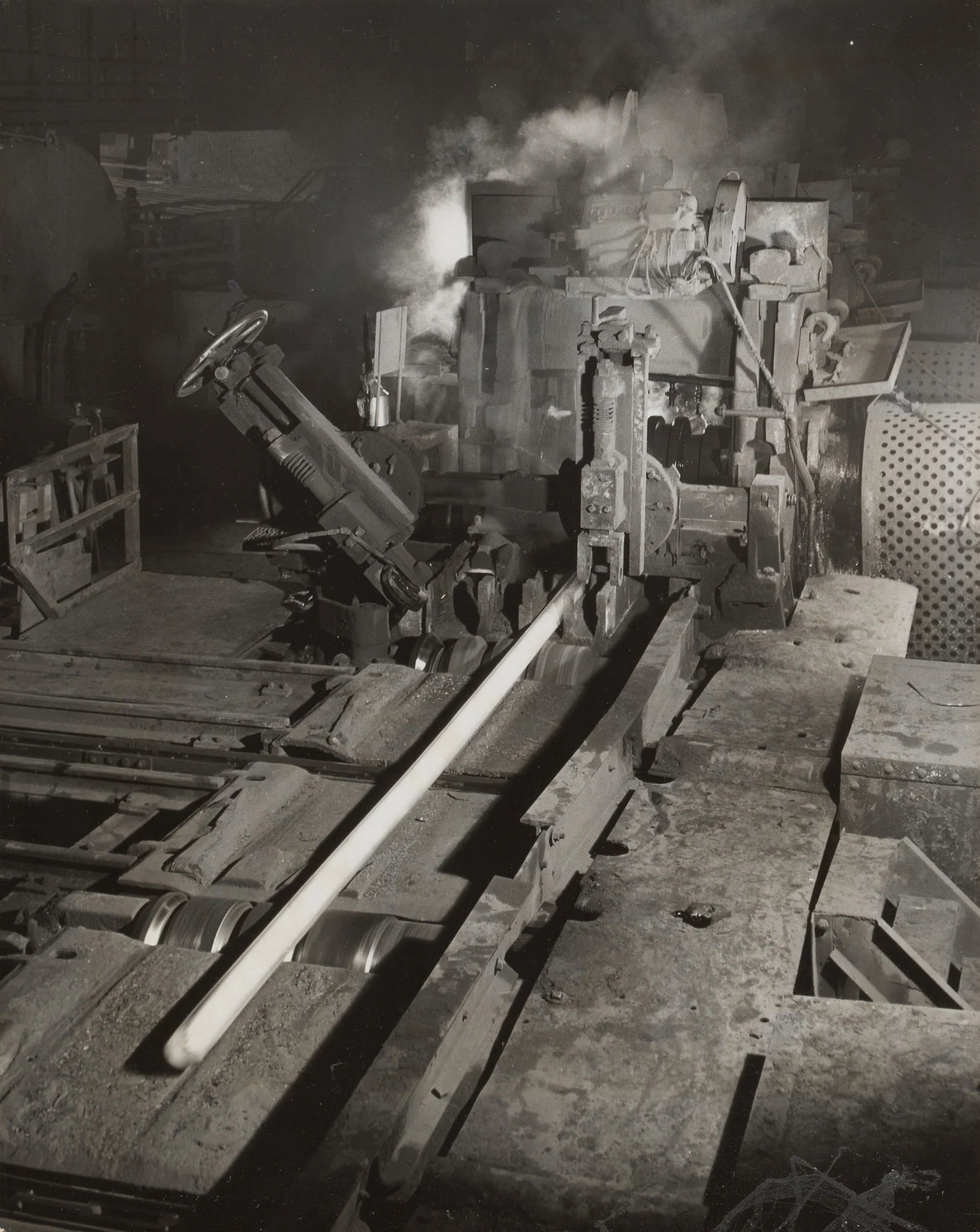 White-hot billet exits 24-inch continuous mill after multiple reductions at Gary Steel Works.