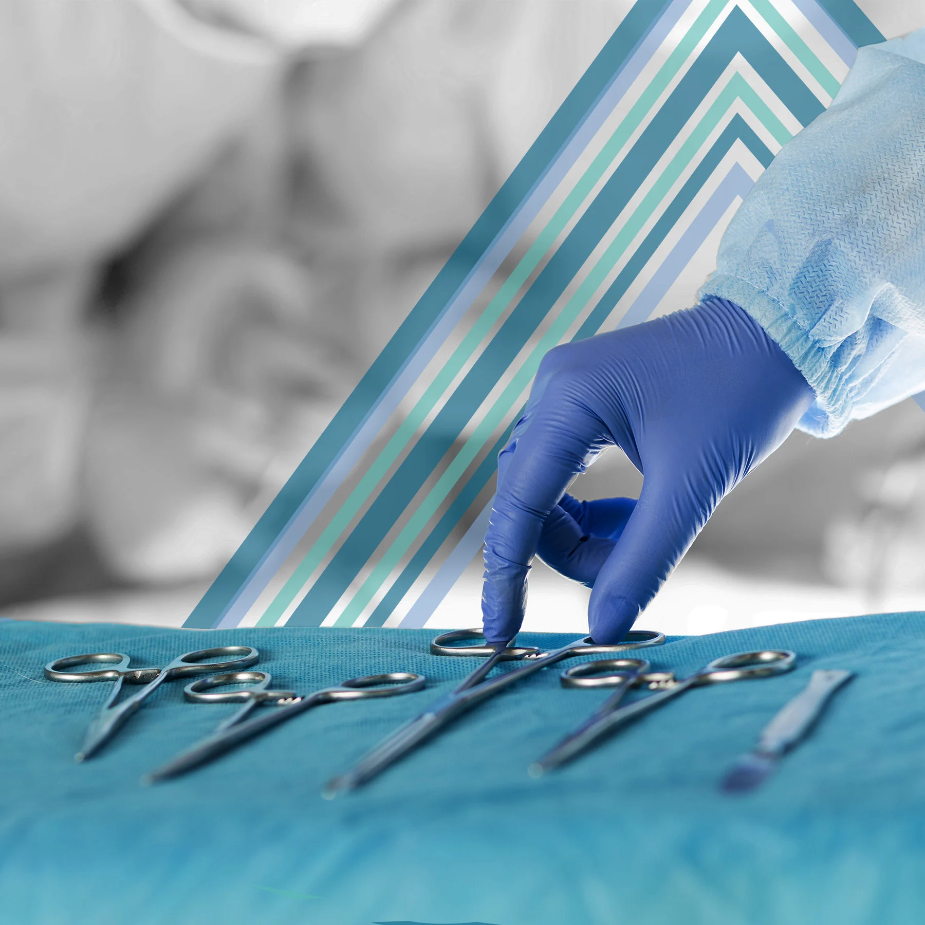 Hand in surgical glove reaching for tool.