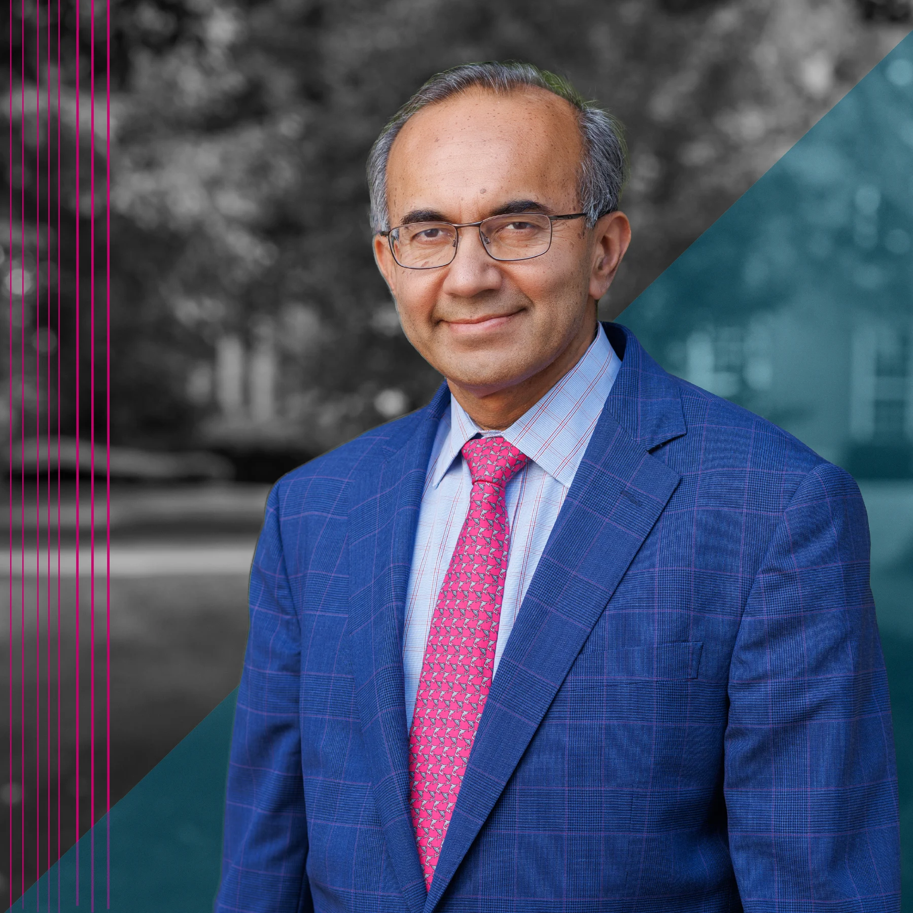 Portrait of a man wearing glasses, a blue suit jacket, and a bright pink tie, facing the camera with a slight smile. The background is blurred in black and white, with teal geometric overlays and pink vertical lines.