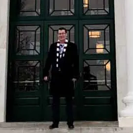 Brian Bosserman outside the HBS building entrance