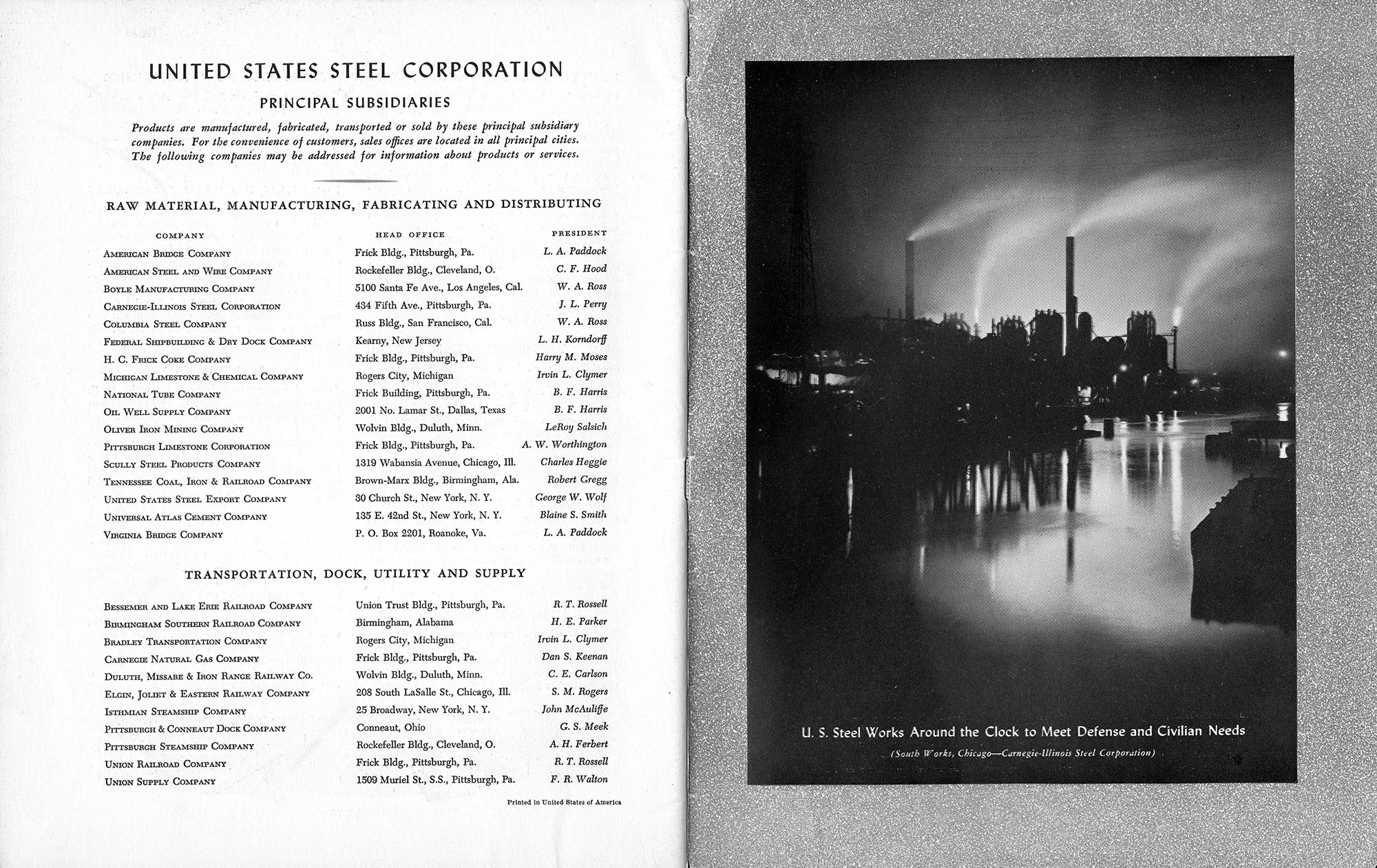 U.S. Steel subsidiary directory alongside South Works in Chicago glowing at night with smoke stacks and reflections on water.