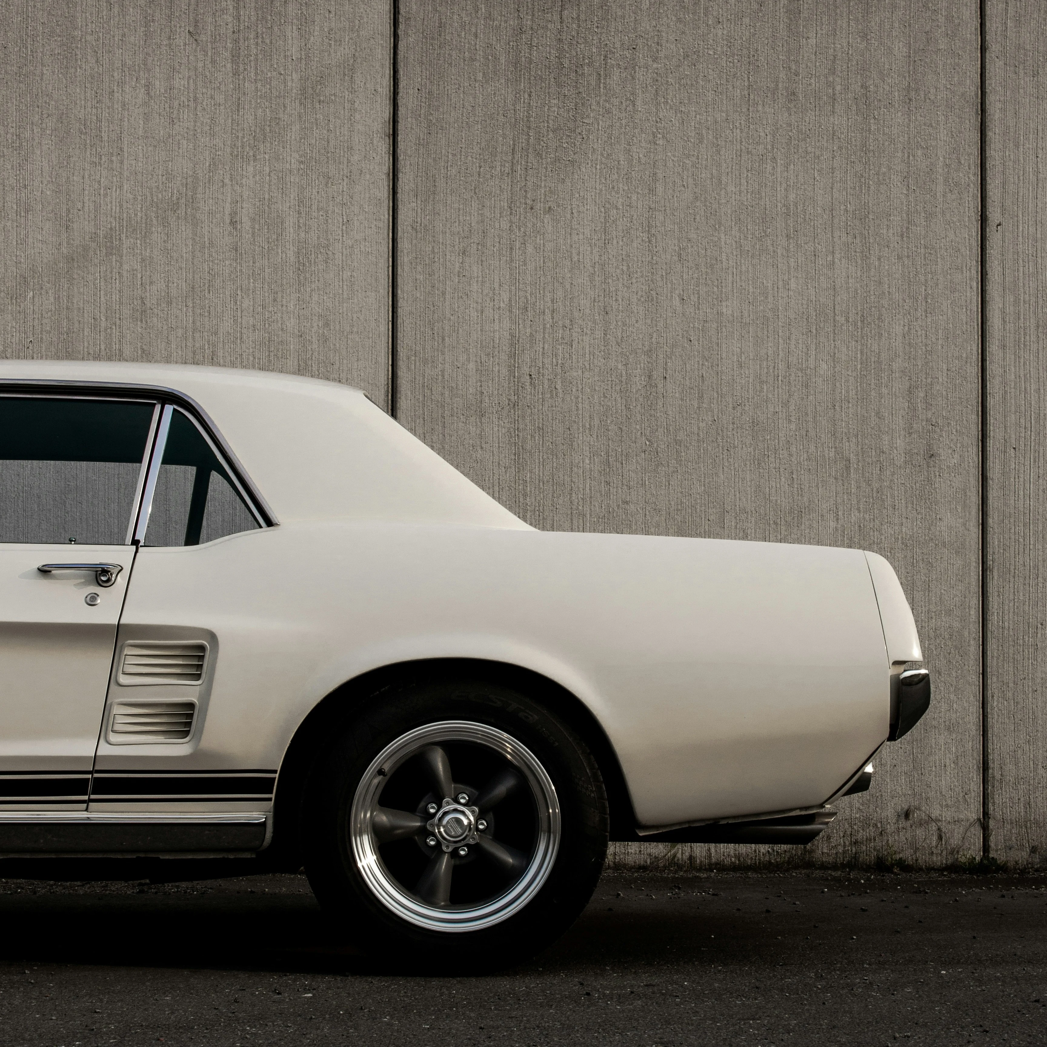 The rear of a white car