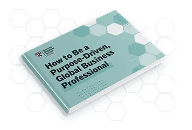Closed book titled "How to Be a Purpose-Driven, Global Business Professional" by Harvard Business School Online.