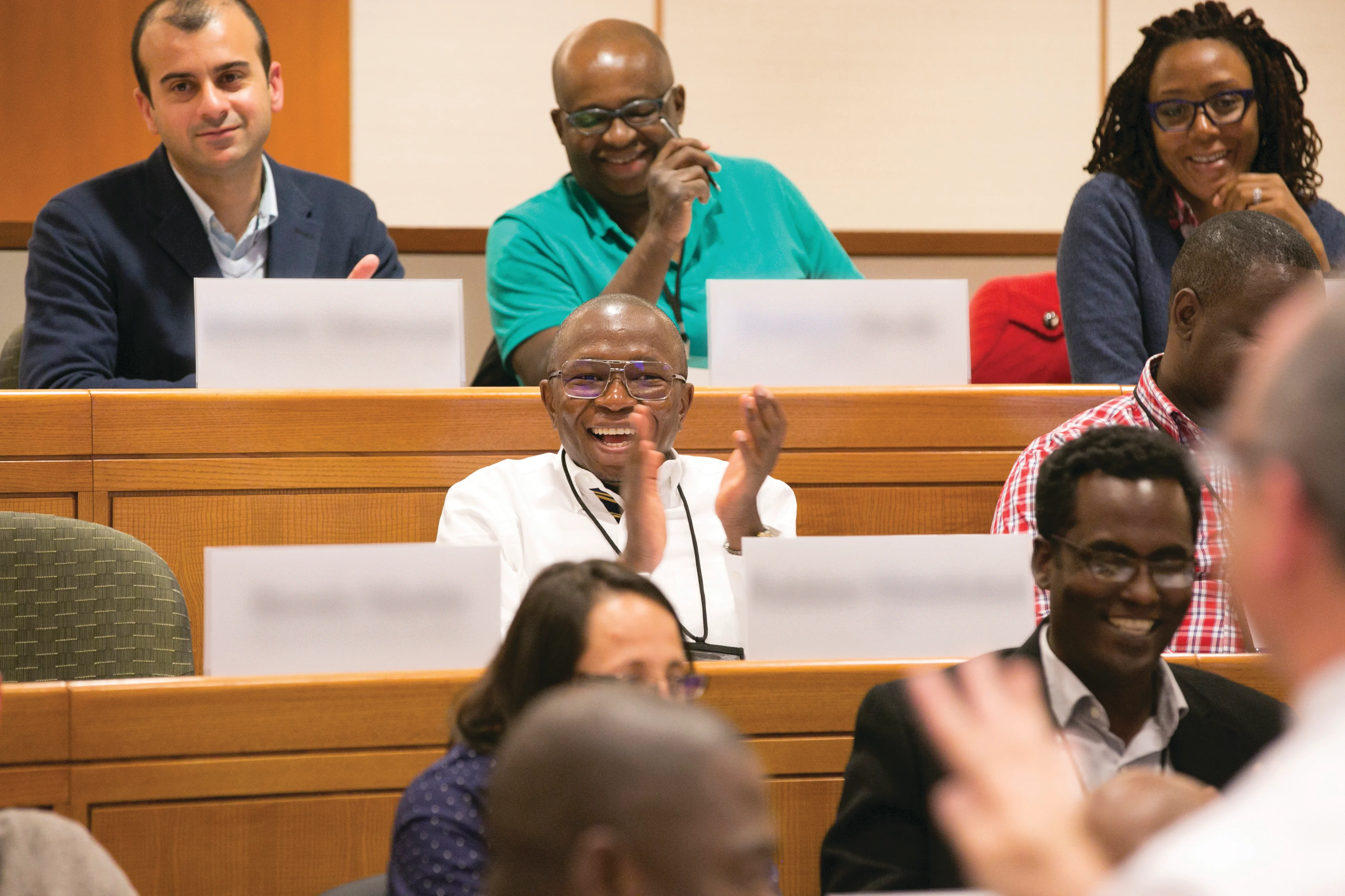 diverse group of executives enjoying the lecture
