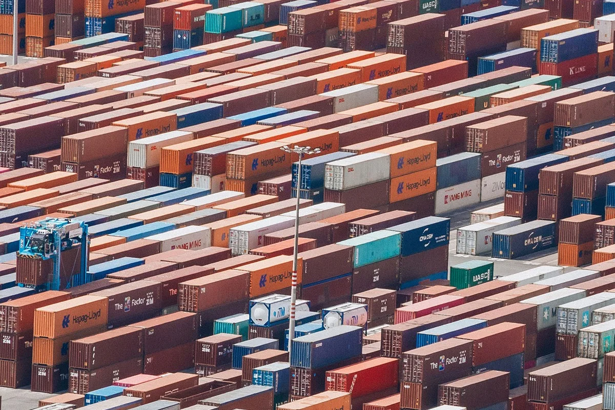Rows of shipping containers at a port