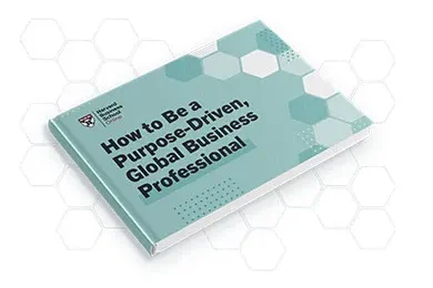 Closed book titled "How to Be a Purpose-Driven, Global Business Professional" by Harvard Business School Online.