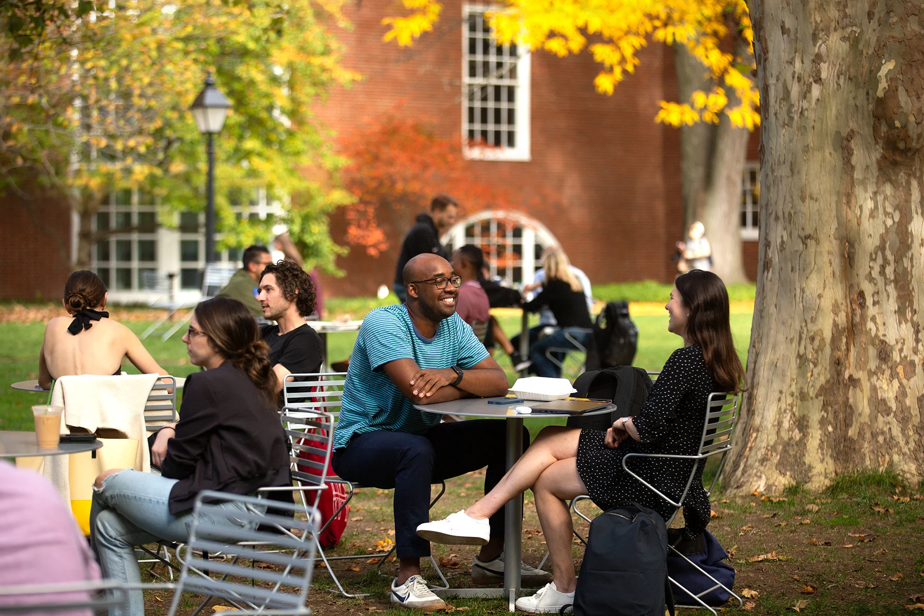MBA students continue the discussion on Schwartz Common