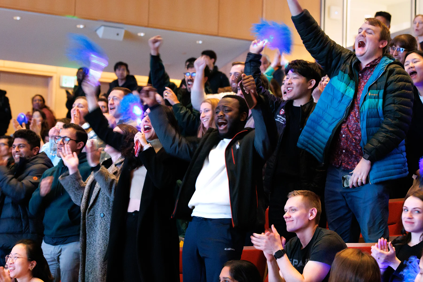 The audience cheers a winner of the 2024 New Venture Competition.