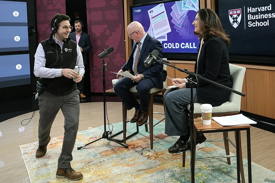Host Brian Kenny and Professor Raffaeella Sadun prepare for a live episode of the Cold Call podcast in the Live Online Classroom.