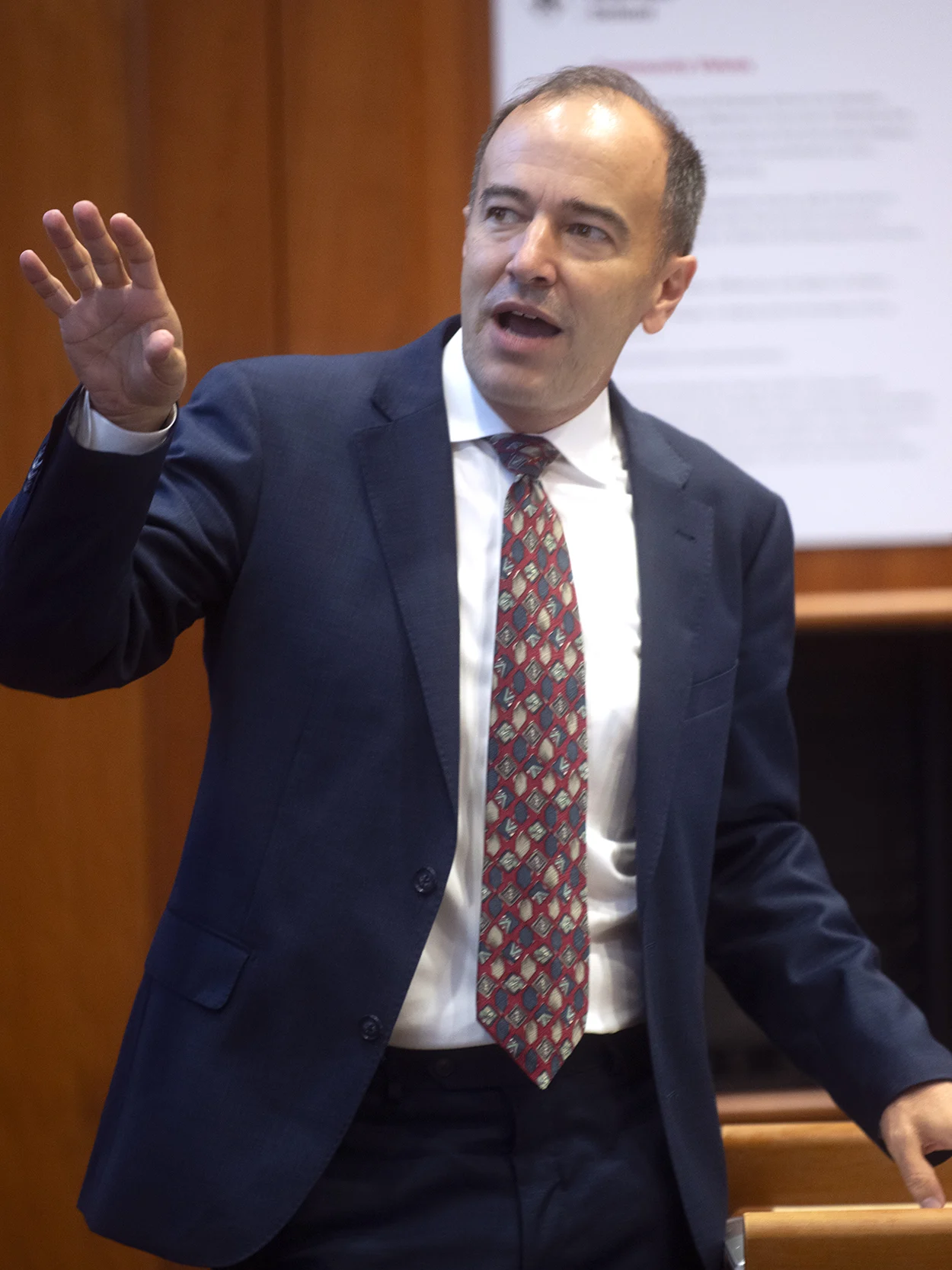 Professor Shawn Cole leads a case discussion in a Harvard Business School classroom.