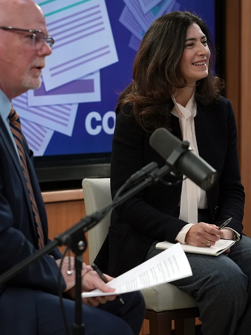 Host Brian Kenny and Professor Raffaeella Sadun prepare for a live episode of the Cold Call podcast in the Live Online Classroom.