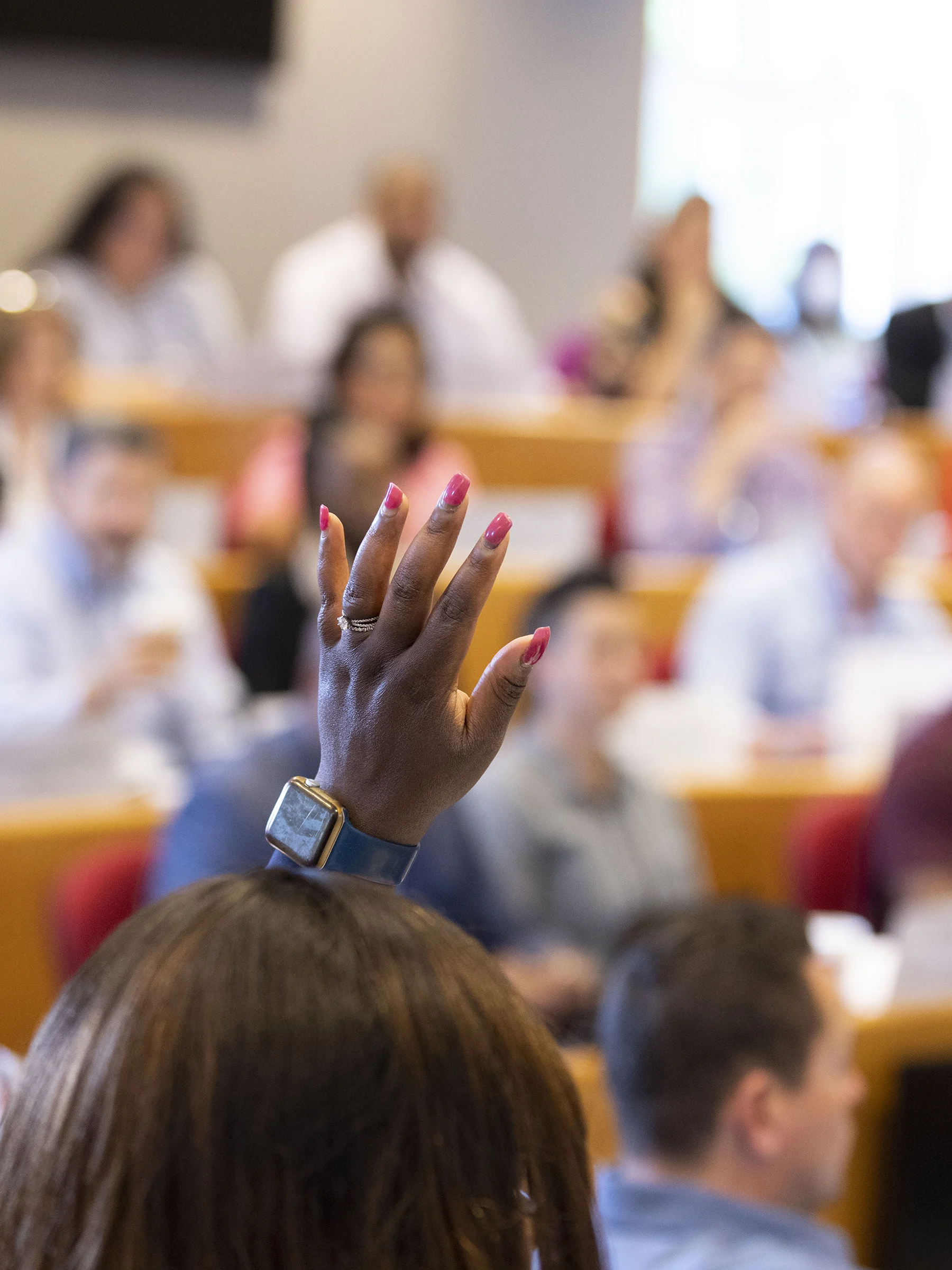 An Executive Education case discussion in a Hawes Hall classroom