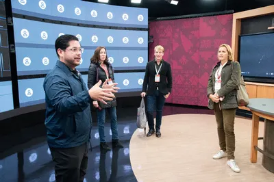 People talking in live online classroom studio