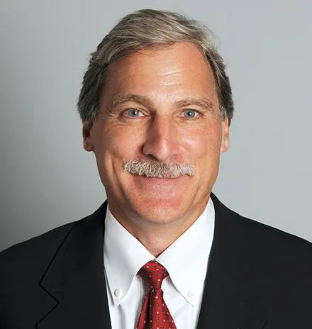 Headshot of Executive Fellow Chet Huber