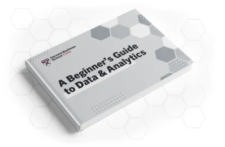 Closed book titled "A Beginner’s Guide to Data & Analytics" by Harvard Business School Online.