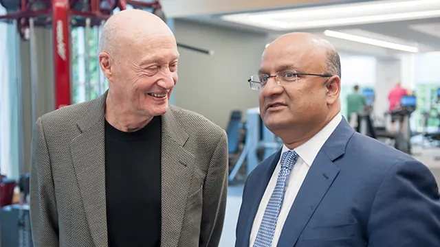 Tim Day and Nitin Nohria talking