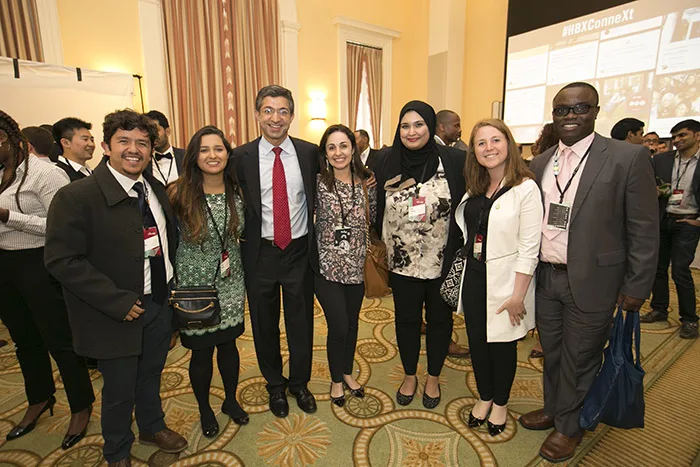 Professor Bharat Anand and students pose for a group photo at HBX ConneXt