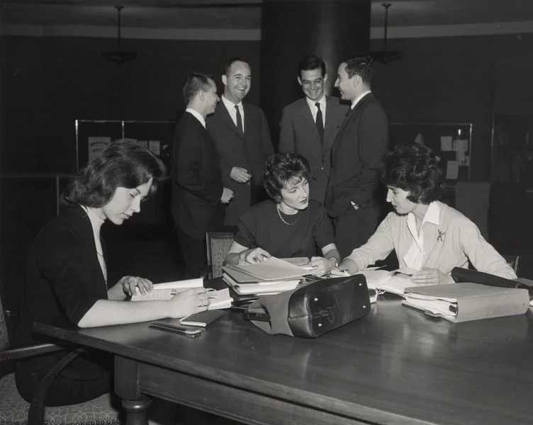 Susan L. Holt (MBA 1965), Caryl M. Brackenridge (MBA 1965) and Cecelia B. Rauch (MBA 1965) studying, ca. 1963