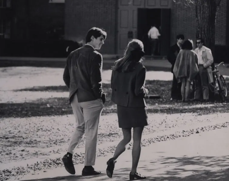 Students walking on path, ca. 1970