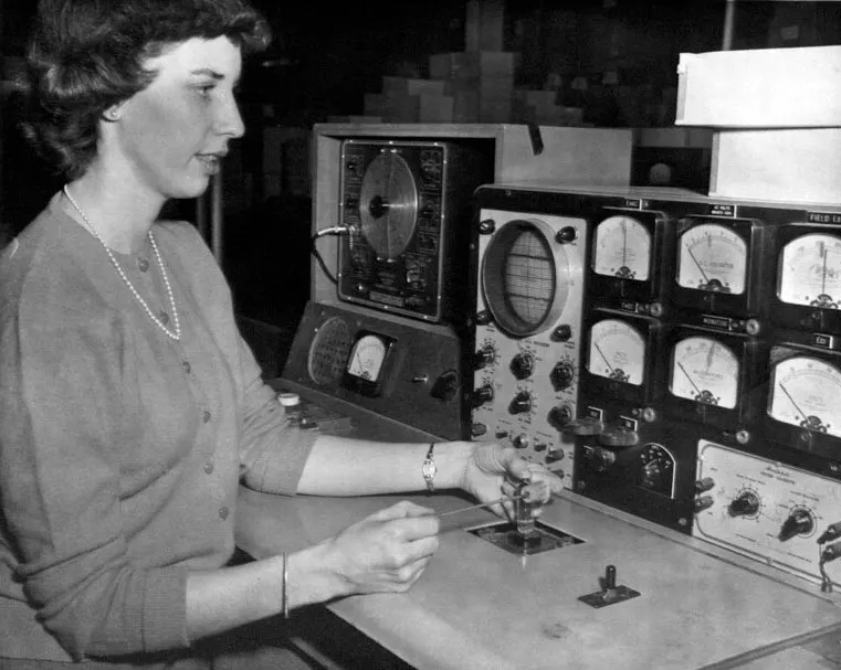 Pat Driscall completing field work, ca. 1957