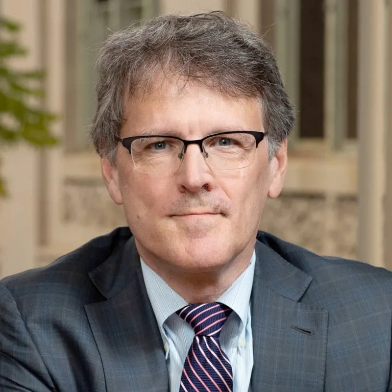 Headshot of John Coates