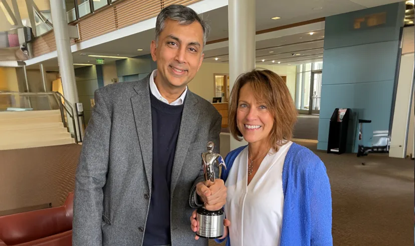 Mihir A. Desai & Ruth Page with a silver Telly Award