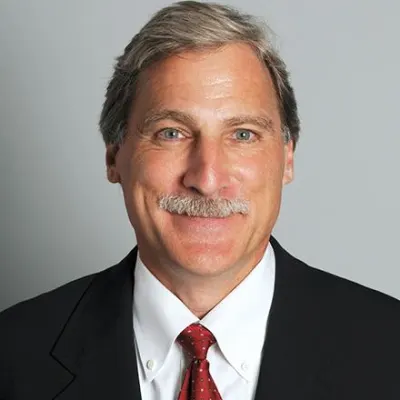 Headshot of Executive Fellow Chet Huber