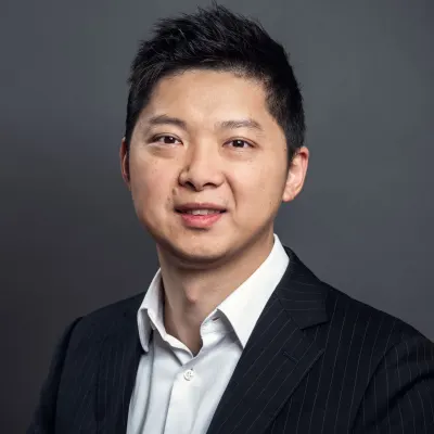 Headshot of participating executive Han Qin