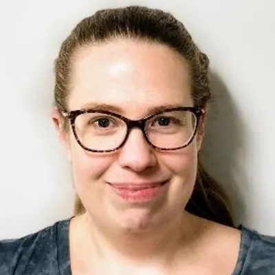 Headshot of Sally Legore Nusholtz