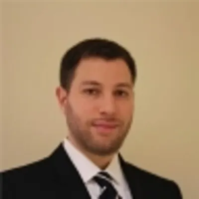 Headshot of Amram Migdal