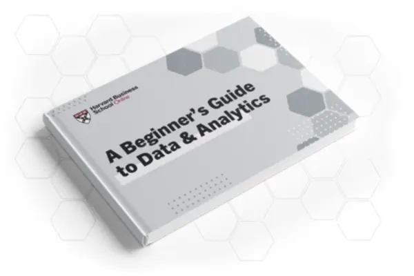 Closed book titled "A Beginner’s Guide to Data & Analytics" by Harvard Business School Online.