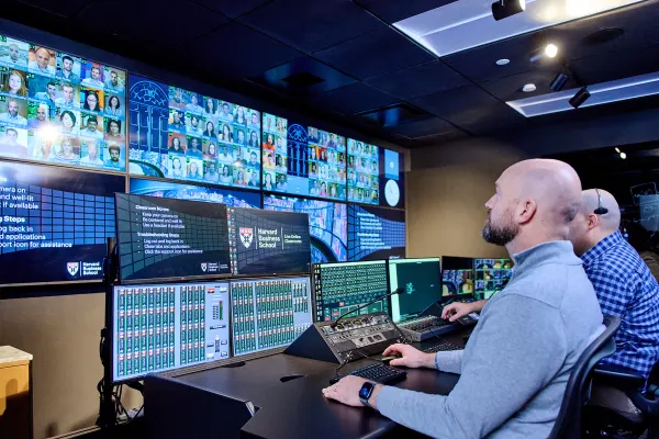 Technicians in the control room of Harvard Business School's Live Online Classroom.