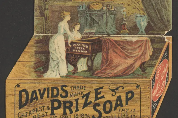 Drawing of two women in Victorian dress at a piano with Davids Prize Soap label beneath