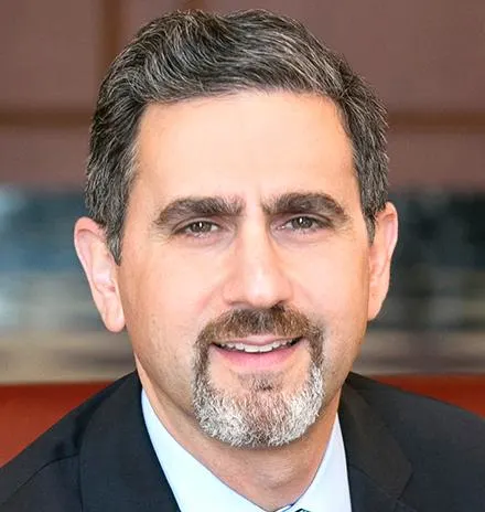 Headshot of Robert S. Huckman