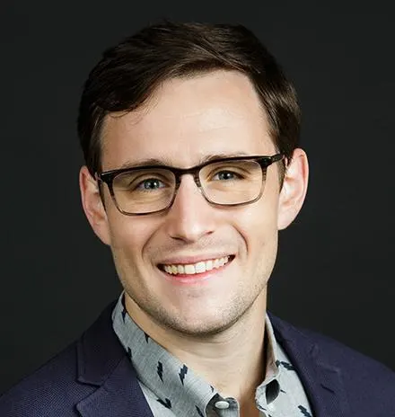 Headshot of Max J. Miller