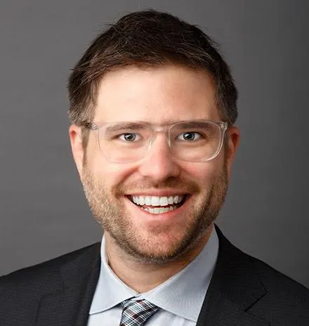 Headshot of Joshua R. Schwartzstein
