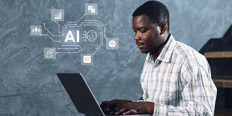 Business professional using AI on a laptop.