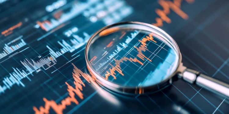 Magnifying glass over a table of generic data points.
