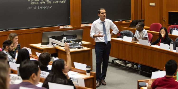 Harvard Business School professor George Serafeim teaching MBA students