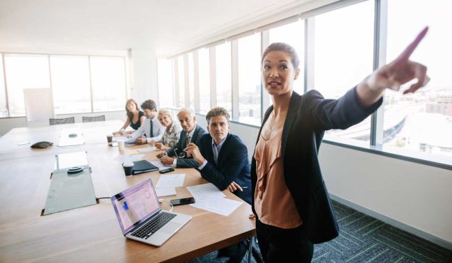 Woman pointing during a presentation