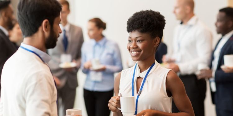 successful entrepreneurs networking at a conference