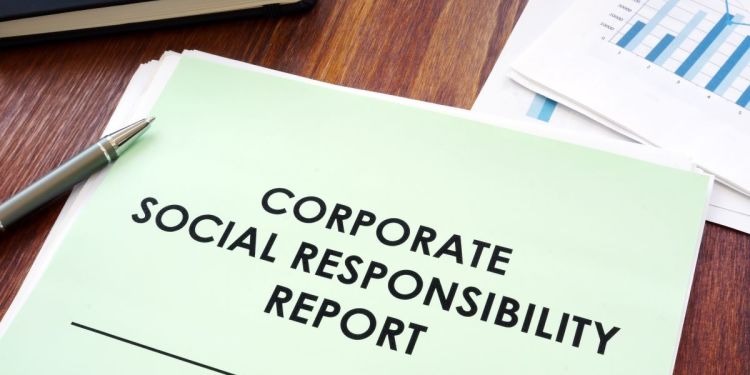 corporate social responsibility report on desk