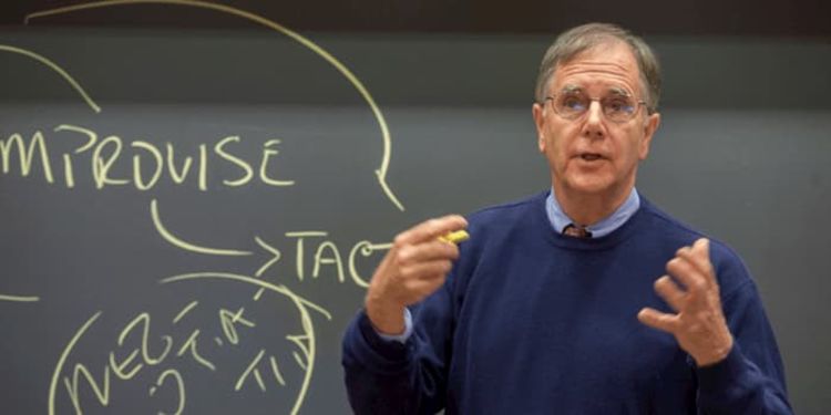Professor Mike Wheeler teaching at a blackboard
